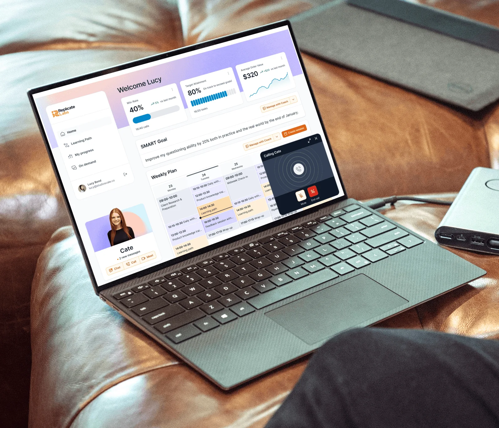 Replicate Labs coaching dashboard on a laptop, with a weekly plan and a live call with the AI coach