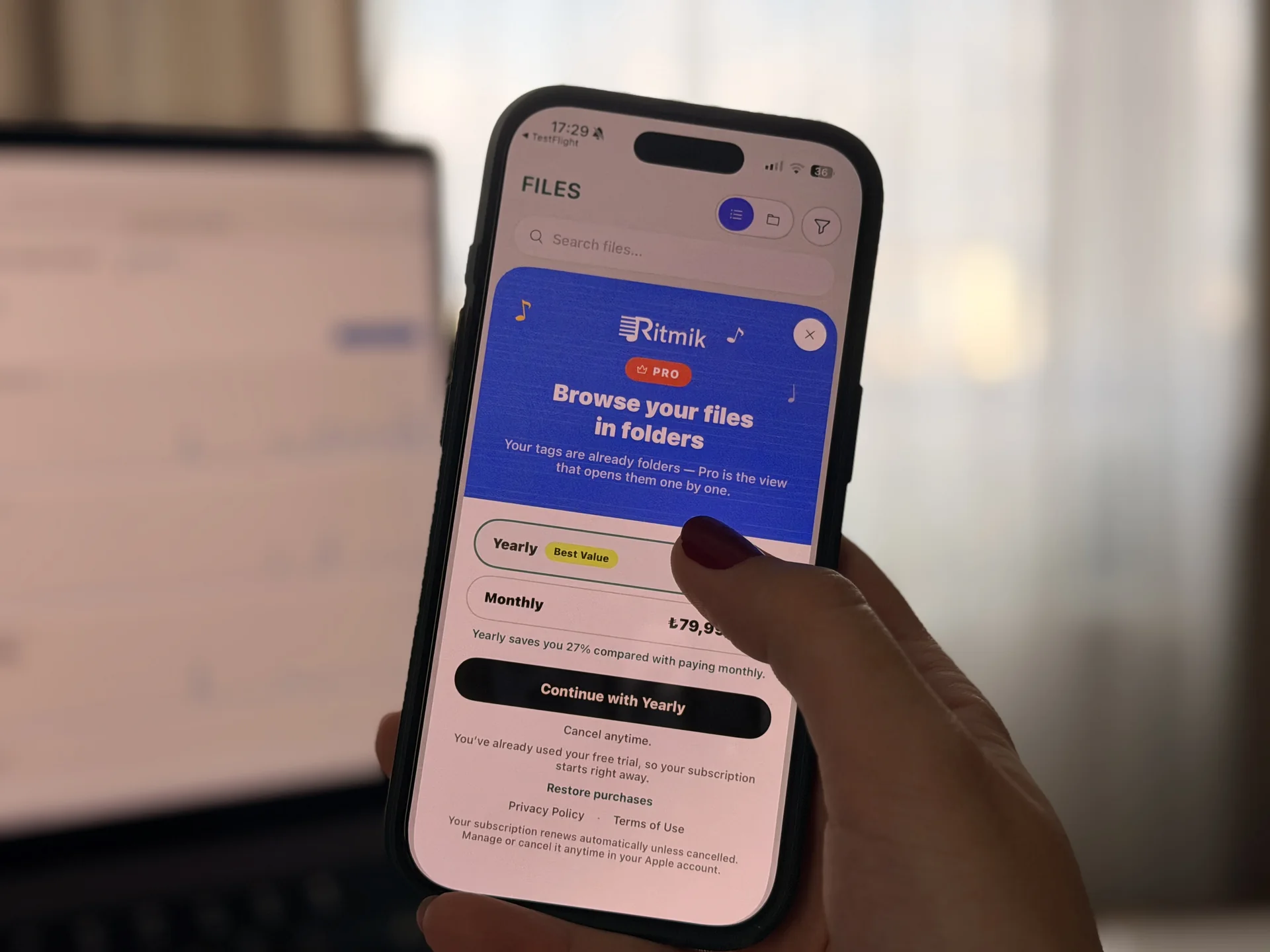 Phone showing a subscription screen in a mobile app